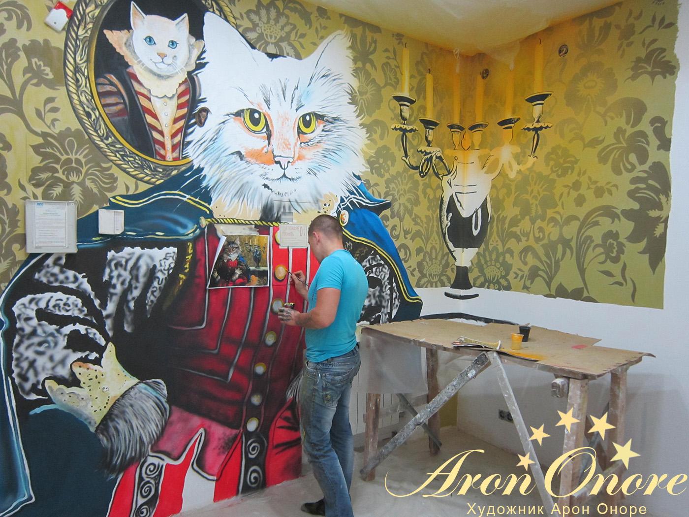 художник арон аноре занимается роспись стен в магазине